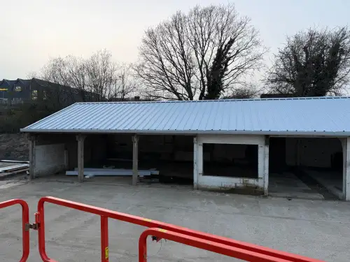 Click Here To Enlarge This Photo Of Asbestos Strip & Re Sheet to Kingspan Composite Roofing System