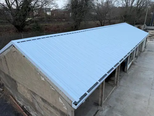 Click Here To Enlarge This Photo Of Asbestos Strip & Re Sheet to Kingspan Composite Roofing System